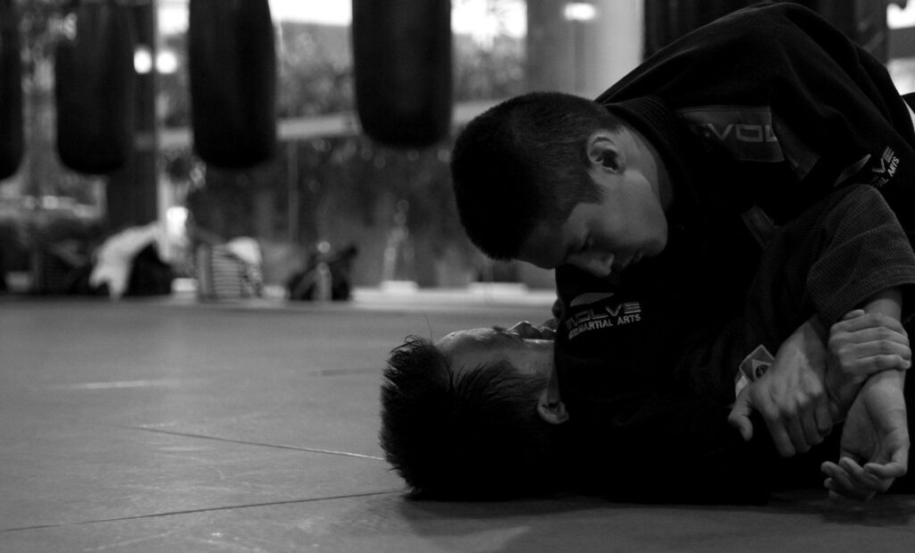 The americana lock is also known as the bent armlock, keylock, top wristlock, figure four armlock in catch wrestling, and ude garami in judo. 