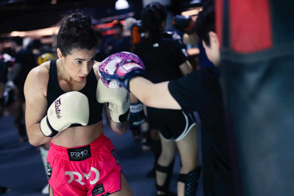 Student focusing on delivering her technique